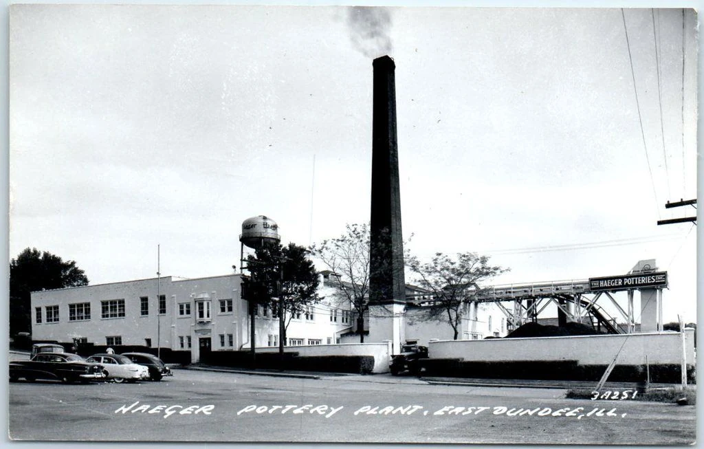 Haeger Pottery Plant, East Dundee, Illinois — smokestack, water tower, and factory building, mid-20th-century postcard